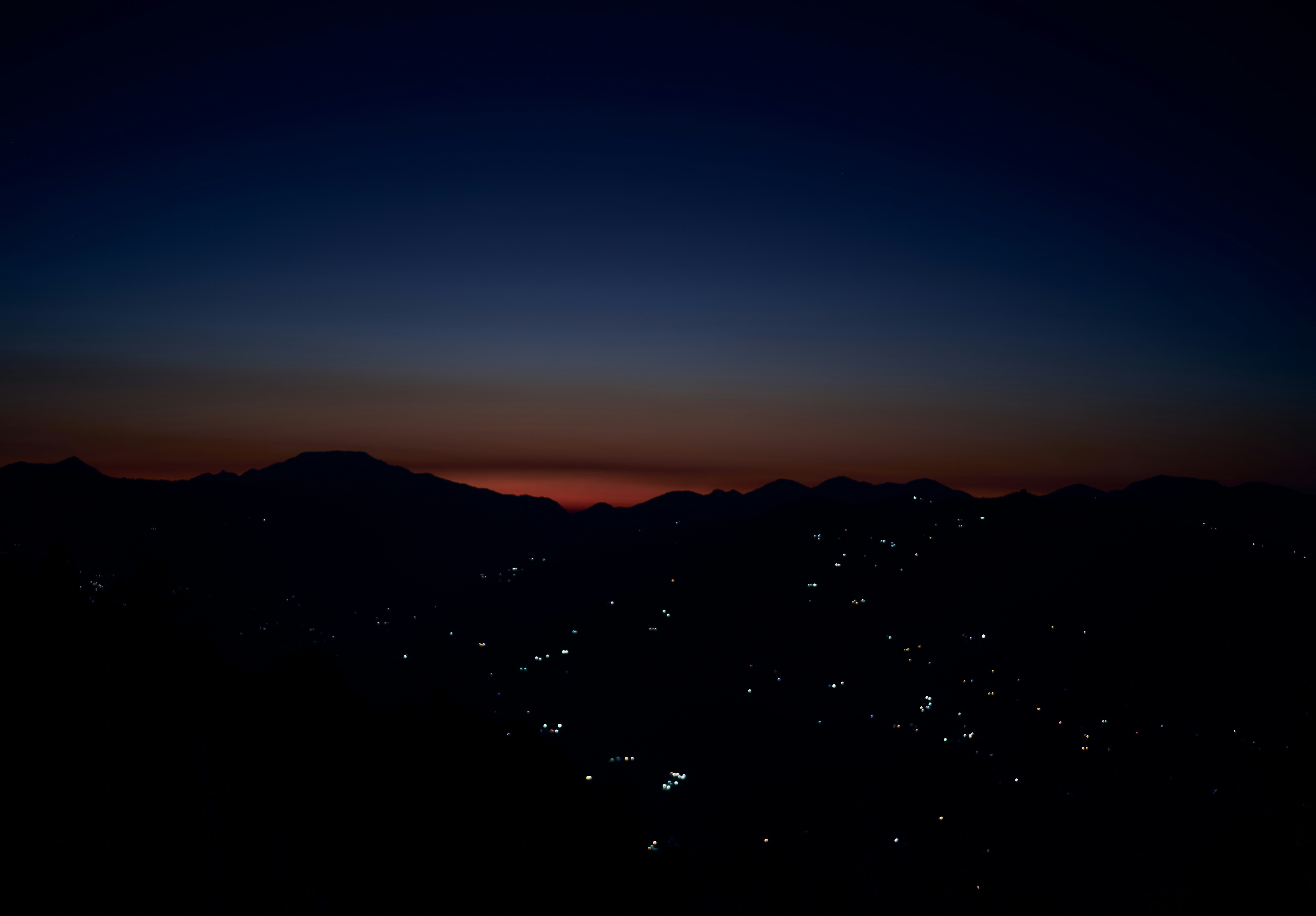 silhouette of mountain during sunset